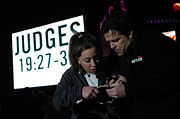 Ron Luce and event participant reading from Judges 19 at "BattleCry" San Francisco, March 25, 2006.